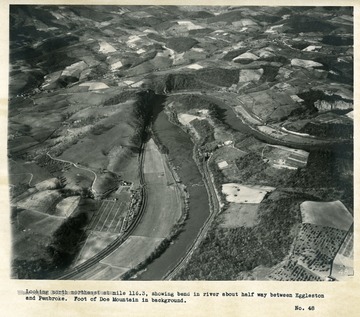 'Looking north northeast at mile 116.3 showing bend in river about half way between Eggleston and Pembroke.  Foot of Doe Mountain in background.'
