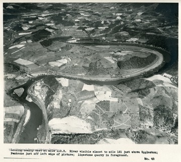'Looking nearly east at mile 113.3  River visible almost to mile 121 just above Eggleston; Pembroke just off left edge of picture; limestone quarry in foreground.'