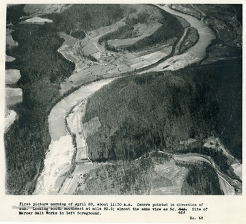 'First picture morning of April 28, about 11:30 a.m.  Camera pointed in direction of sun.  Looking south southeast at mile 82.2; almost the same view as no. 62A.  Site of Mercer Salt Works in left foreground.'