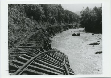 'Flood damage; Nicholas, Fayette, and Greenbrier Railroad tracks washed out by Hurricane Camille 1/2 mile south of Anjean, Greenbrier County, W. Va.'