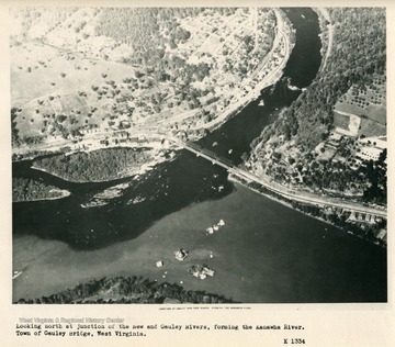 'Looking north at junction of the New and Gauley Rivers, forming the Kanawha River.  Town of Gauley Bridge, West Virginia.'