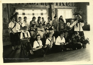 Members of 4-H music group with instruments.