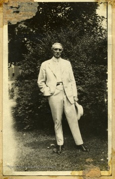 Dr. Waitman Barbe stands in a garden.