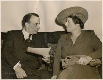 'Nation Wide Drive to Raise One Million Dollars by July 1st 1941, for the relief of the war stricken people of China.  Photo shows, Col. Theodore Roosevelt, Jr., member of the Board, with Miss Pearl S. Buck, noted author and chairman of the newly formed China Emergency Relief committee, meet at the apartment of Mrs. Hughes, at 471 Park Ave., during the tea hour...'