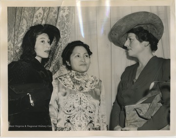 'Nationwide drive to raise one million dollars by July 1, 1941, for the relief of the war-stricken people of China. Photo shows...left to right, Miss. Luise Rainer, English Actress, Mrs. Frank Co Tui, wife of Executive Vice President of the American Bureau for Medical Aide to China., and Miss Pearl S. Buck, noted author chairman of the newly formed China Auspices Drive...meet at Mrs. Hughes, Apartment for tea at 471 Park Ave, NYC.'