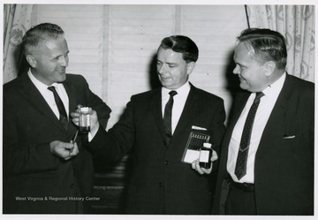 Senator Robert C. Byrd in center with others.