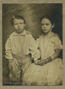 Portrait of two young members of the Davis family. It may be John W. Davis' mother on the right.