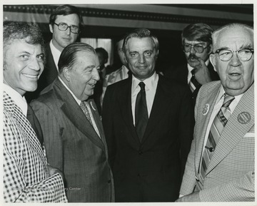 Far Left:?, Background left: Jay Rockefeller, Jennings Randolph, Center: Walter Mondale, Background Right: Unidentified, Far Right: Okey Patterson