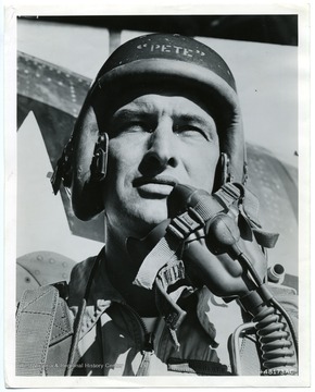 Lt. Col. F. K. Everest, Chief of Flight Test Operations Laboratory at Edwards Air Force base, Calif., and test pilot for the North American F-200, unofficially set a new world speed record of 754.96 miles per hour over a 15 kilometer course in an F-100 "Super Sabre" along the Salton Sea in California, 29, October 1953.'