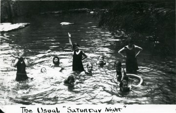 A group of young women swimming in a creek, 'the usual Saturday night.'