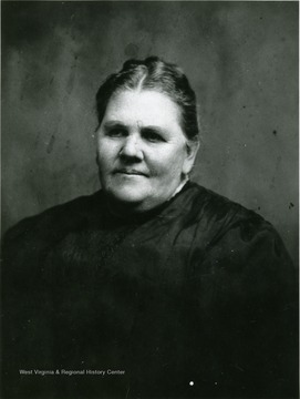 A portrait of Harriet Ellison, the daughter of Clara E. (Petrie) Dunlap and Addison Dunlap and the wife of J.Z. Ellison.