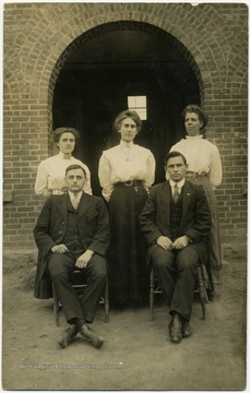Miss Stella Woofter 'teacher' back row on right.