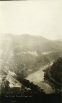 A photograph of a river valley from above.