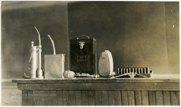 A photograph of a group of laboratory equipment in a classroom.