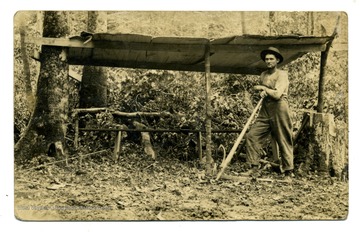 A man clearing brush in Lewis County, W. Va.