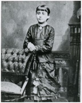 'Daughter of Aretas Brooks &amp; Carrie Watson Fleming, her first silk dress.'