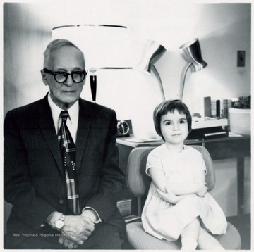 'This photo is C.E. Trembly and his 5 year old grand-daughter Cristy Trembly taken on his 90th birthday April 14, 1963.'