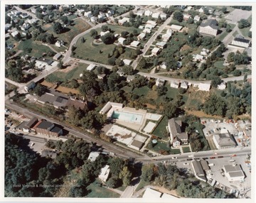 An aerial view of Main Street Bridgeport, there is a Bridgeport Swimming Pool near center.