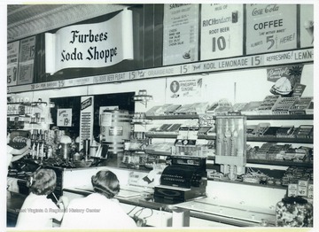 A view of soda shoppe section of the Furbee's Rexall Drug store on West Main Street of Bridgeport, W. Va..