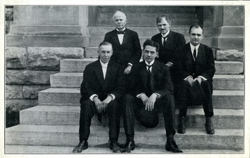 Front row on the right is Bishop Grose and a man in the middle in the back row is Bishop Hughes; at the time the photo was taken neither of them were bishops yet.