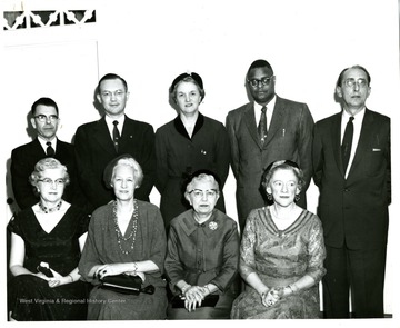 Bottom Row, Left to Right: Dr. Grace Scott, Director, Supervisor's Program, WVU; Dr. Florence B. Stratemeyer, Professor of Education, Columbia University; Mrs. Freda Conway, Head, Department of Education, West Liberty State College; Miss Genevieve Starcher, Supervisor, Bureau of Teacher Certifications and Recommendations, State Department of Education. Top Row, Left to Right: Dr. Eddie C. Kennedy, Director of Elementary Student Teaching, WVU; Dr. Eston K. Feaster, Dean of the College of Education, WVU; Corma A. Mowrey, Director of Professional Services, West Virginia Education Association; Dr. J. Lee Irving, President of the West Virginia Association for Student Teaching; and Mr. Ralph Cunningham, Professor of Education, Concord College. 