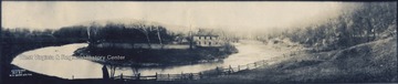 A photograph of Jackson's Mill taken from across the bend in the river.