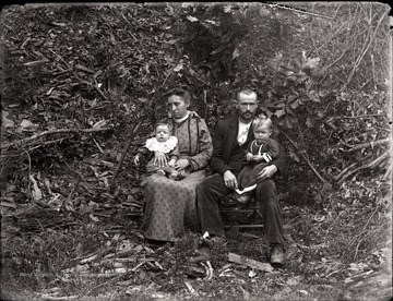 A portrait of a couple and their two children taken outdoor in Helvetia, W. Va.