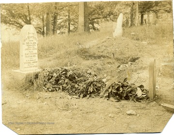 'Grave of mother of 'Stonewall' Jackson at Ansted, W. Va. as it appeared in 1906. In 1916 some interested friends had lot surrounded by iron fence and area overhauled.' July 17, 1907 Note sent to Mr. Thomas Ranson in Staunton, Va. from Tidewater Railroad Company that reads, 'Mr. Thomas D. Ranson, I take pleasure in enclosing herewith a recent photograph of the grave of Julia Beckwith Neale which was taken by our photographer here. Yours very truly, W. H Evans.'