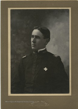 Unidentified male in uniform with U.S.V pins on collar. 