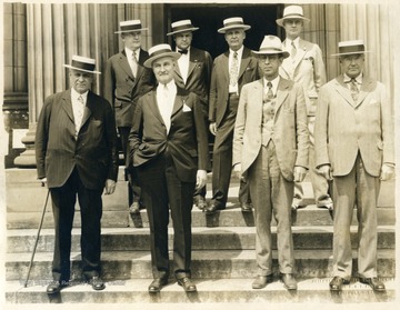Prosecuting Attorneys since the election of 1892. Front row, Left to right- Charles Powell, George M. Alexander, Scott C. Lowe, Tusca Morris. Back row- Walter R. Haggerty, Frank R. Amos, M.W. Ogden, M.E. Morgan.