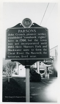 'Parsons- John Crouch pioneer settler established "tomahawk rights" here in 1766, but the town was not incorporated until 1893. Here Shavers Fork and Blackwater unite to form the Cheat River. Hu Maxwell, the historian, lived near.'