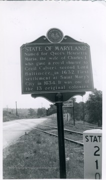 'Named for Queen Henrietta Maria, the wife of Charles I, who gave a royal charter to Cecil Calvert, second Lord Baltimore, in 1632. First settlement at Saint Mary's City in 1634. It was one of the 13 original colonies.' The marker is between Terra Alta W.Va. and Oakland, Md.
