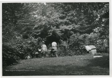 'The Deakins Family Cemetery is unusual in that it is still in current use although surrounded by thousands of suburban Maryland homes.'  The name J.C Wilfong Jr. appears on the back of photo.
