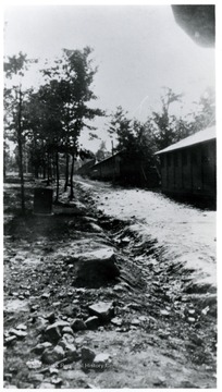 A view of C.C.C. Camp: No. 3 Barracks, No. 4 Barracks and Recreation Hall shortly after the camp was moved from Kingwood.  CCC59.