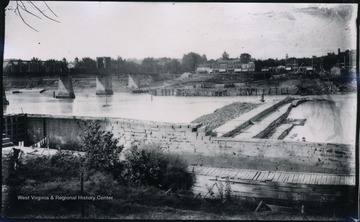In the foreground of the photo is the Harmer Lock (Lock #1, Muskingum River), built around 1837, and across the river is its replacement, under construction.