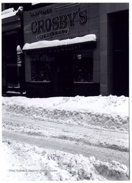A view of Crosby's Jewelers' storefront during the Great Thanksgiving Snow in 1950; the store is on the south Third Street behind what would be New City in 1990.