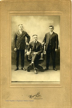 Lawrence Pietro is seated in the middle. 