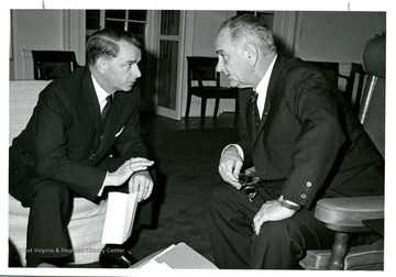 Senator Robert C. Byrd discusses matters with President Lyndon B. Johnson.