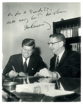 John F. Kennedy and Secretary of State Joe Burdette enter the W. Va. Primary.