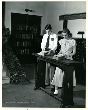 Two students at card catalog.