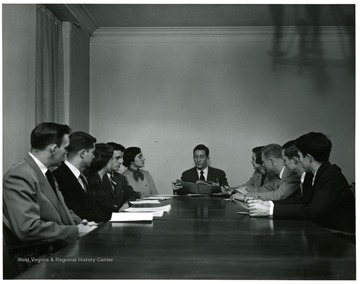 Shown here is a meeting of Ten-member Executive council, and Legislature composed of representatives from each college and school are elected by and from the student body.