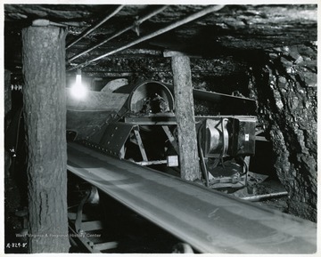 This is written on the back of the photo: 'Junction point two (2) 30"x1200' Conveyors Truax Traer Company, Elkville now used in Cabin Creek mines in West Virginia'