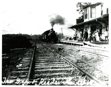 A train arriving to the Reedsville depot in Preston County, W. Va.  The depot is located near the Sterling Faucet Plant.