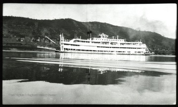 A river boat sails down on the Ohio River.
