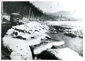 A view of M &amp; W Street car runs with the big ice gorge nearby from the Monongahela River.