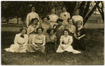 'Checked shirt 2nd from left front is Gertrude Hardway.'