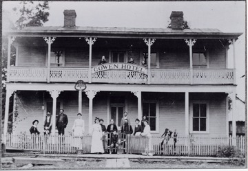 Group portrait in front of the hotel. The Cowen Hotel was located "opposite of the Depot and below present-day Minnichs Florist."
