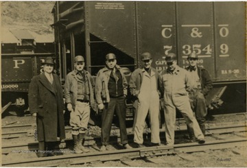 Left to right: W. A. Ogg, Ed B. Raigvel, F.C. Menk, Raymond E. Salvati, John J. Foster, Eddy C. Curris
