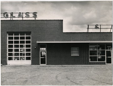 From "Beckley U.S.A." by Harlow Warren, p. 618, 619, vol. 2. In book: "American Glass and Mirror Co., Incorporated. 'If It's Glass We Have It.' Herbert Atha Jr., Owner-Manager. Beckley-Mt. Hope Road at Calloway Heights. Automobile glass-window glass-plate glass-mirrors-glazing-show cases-door glass-resilvering-furniture tops-glass blocks-cathedral glass" (p. 618-619). Three sections, see records 036434, 036436.
