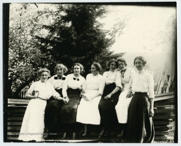 Left to right: Hulda Dubach, Verena Metzener, Della Vogel, Bertha Engler, Mary Metzener, Julia, Burky, Ruth Fahrner.